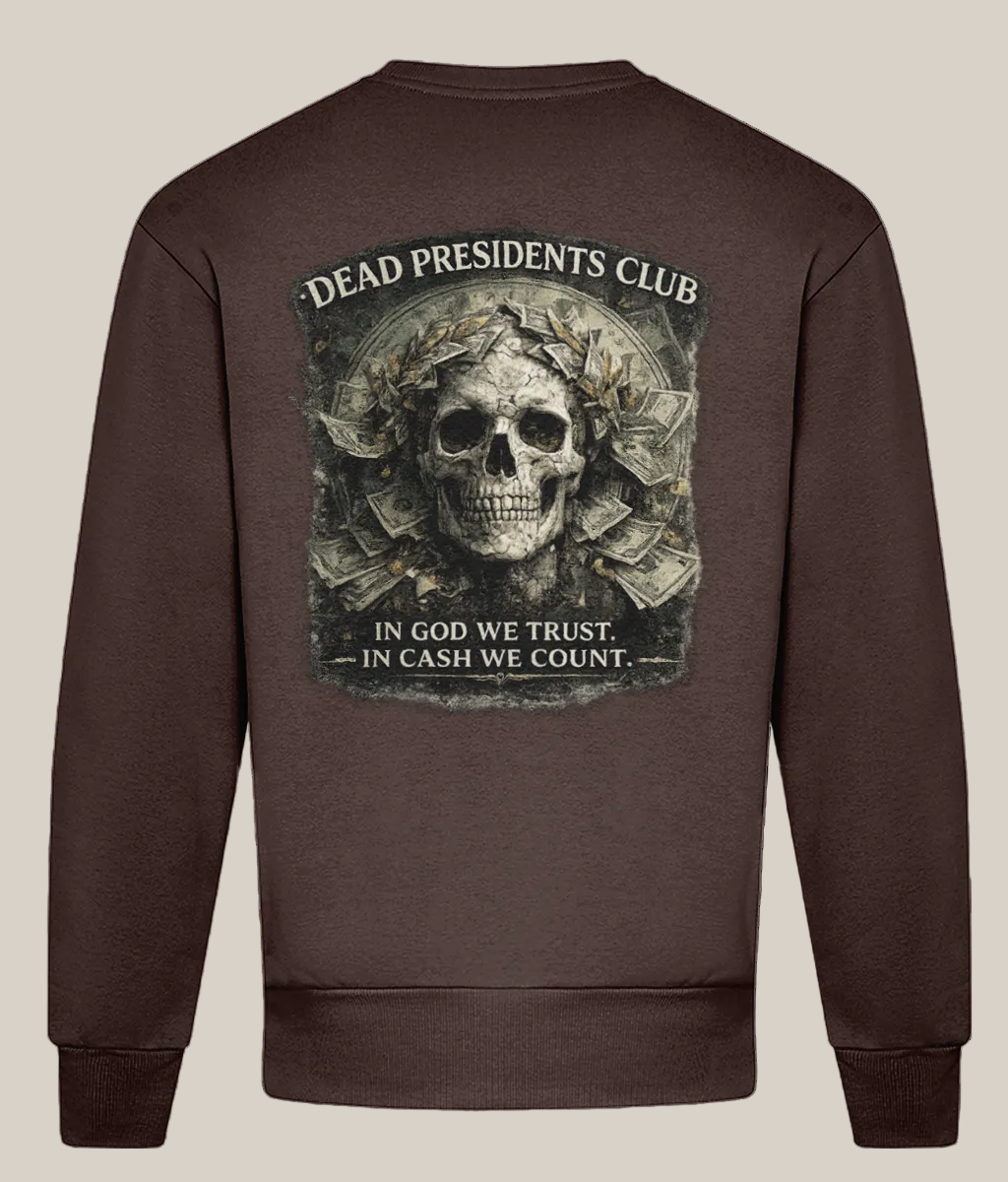 Brown sweatshirt with a skull and money design on the back, featuring text 'Dead Presidents Club' and 'In God We Trust, In Cash We Count'.