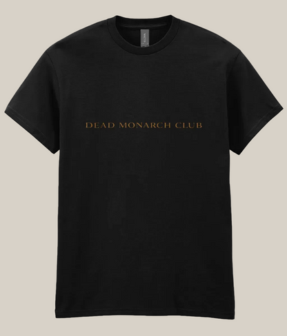 Black t-shirt with 'DEAD MONARCH CLUB' text in gold on a white background