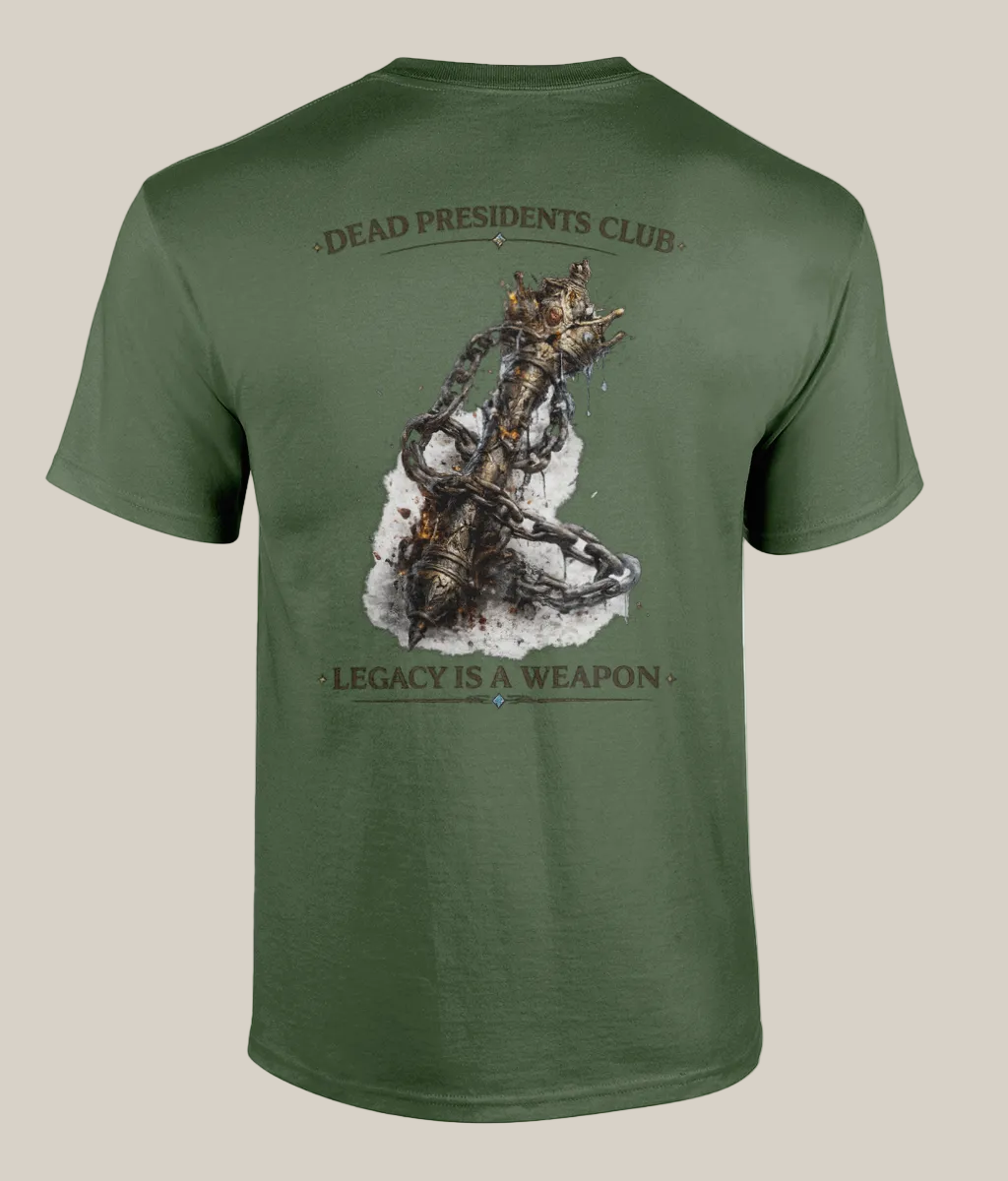 Green t-shirt with a graphic design and text on the back, displayed against a white background.