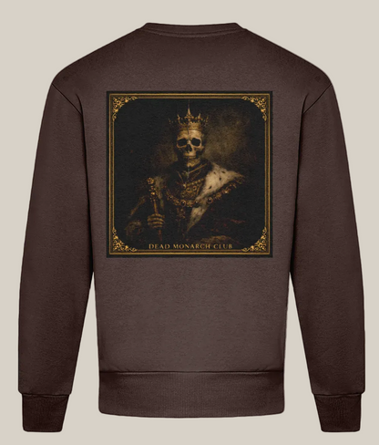 Brown sweatshirt with a graphic of a skeleton wearing a crown and holding a scepter on the back, labeled 'Dead Monarch Club'.