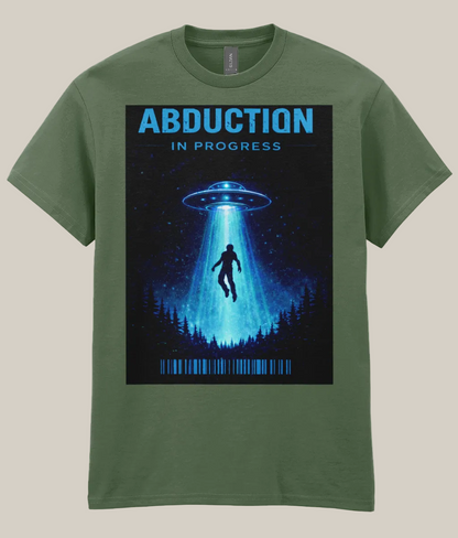 Green t-shirt with a graphic of a UFO and silhouette under a starry sky, labeled 'Abduction in Progress'.