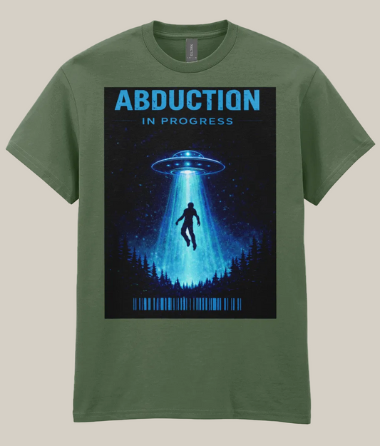 Green t-shirt with a graphic of a UFO and silhouette under a starry sky, labeled 'Abduction in Progress'.