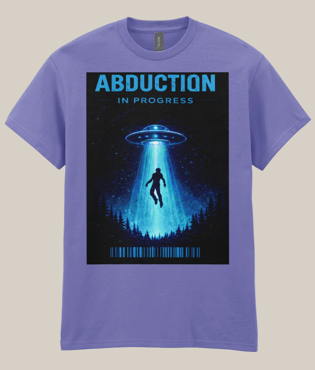 Purple t-shirt with alien abduction graphic and text on a white background