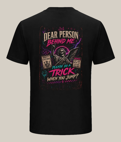 Black t-shirt with colorful graphic design on the back featuring text and a statue illustration.