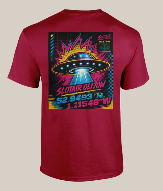 Red t-shirt with a colorful UFO graphic on the back, featuring coordinates and text.