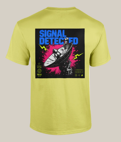 Yellow t-shirt with graphic design and text 'Signal Detected' on a white background
