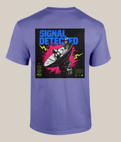 Purple t-shirt with a graphic design on the back featuring a person with a satellite dish and 'Signal Detected' text.