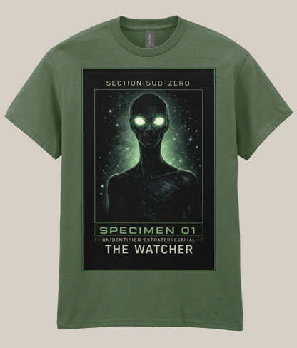 Green t-shirt with alien graphic and text on a white background